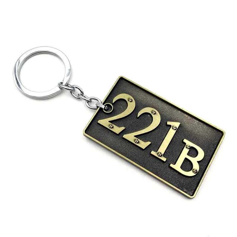 Chaveiro Sherlock Holmes Placa 221B Dourado