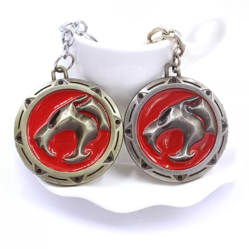 Chaveiro Thundercats Logo Tigre Dourado/Prata