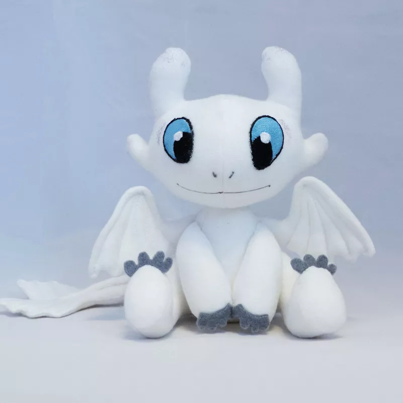Pelúcia Dreamworks Como Treinar Seu Dragão 3 Fúria da Luz Light Fury 25cm
